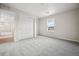 A simply decorated bedroom with carpet, neutral walls and a closet at 16633 W 93Rd Way, Arvada, CO 80007