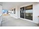 Covered outdoor patio with ample natural light, offering the perfect space for relaxing and entertaining guests at 16633 W 93Rd Way, Arvada, CO 80007
