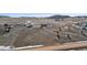 Expansive aerial view showcases a rural homesite with surrounding acreage in a serene, open setting at 12990 Mesa View Rd, Larkspur, CO 80118