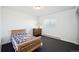 Bedroom with a bed and dresser at 12990 Mesa View Rd, Larkspur, CO 80118