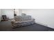 The living room has neutral carpeting and a sofa at 12990 Mesa View Rd, Larkspur, CO 80118