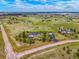 A sprawling estate featuring a home and detached garage situated on a large parcel of picturesque land at 34682 Stampede Cir, Elizabeth, CO 80107