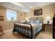 Cozy bedroom with a comfortable bed, natural light, and tasteful decor creating a relaxing ambiance at 34682 Stampede Cir, Elizabeth, CO 80107