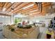 Spacious garage set up for a train hobbyist with ample workspace and natural light at 34682 Stampede Cir, Elizabeth, CO 80107