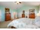 The main bedroom features an ensuite bath, neutral carpet and relaxing wall color at 34682 Stampede Cir, Elizabeth, CO 80107