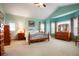 The primary bedroom offers a tranquil retreat with serene wall color and natural lighting at 34682 Stampede Cir, Elizabeth, CO 80107