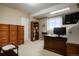 Functional office space with ample storage, bright lighting, and a well-organized workspace at 34682 Stampede Cir, Elizabeth, CO 80107