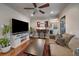 Stylish living room showcasing a breakfast bar, hardwood floors, and a comfortable sofa at 3327 Irving St, Denver, CO 80211