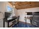 Bright home office space with wood floors, ample natural light, and two workstations for productivity at 3327 Irving St, Denver, CO 80211