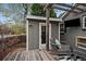 Backyard patio with pergola, shed, and comfortable seating; perfect for outdoor living and entertainment at 3327 Irving St, Denver, CO 80211
