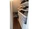 Custom shoe closet with shelving, shoe racks, and clear storage boxes for stylish organization at 3327 Irving St, Denver, CO 80211