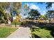 A serene park with a gazebo, benches, and mature trees offers a peaceful setting for relaxation and outdoor enjoyment at 18633 Stroh Rd # 2-104, Parker, CO 80134