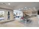 Entertaining basement with ping pong table, and access to the exterior grounds at 6155 Puma Pt, Lone Tree, CO 80124