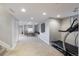 Spacious finished basement area with carpet flooring and neutral paint; the perfect flexible living space at 6155 Puma Pt, Lone Tree, CO 80124