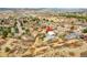 Wide aerial view of the property and neighborhood in a slightly rural setting with a few houses at 228 Birch Ave, Castle Rock, CO 80104