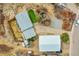 Aerial view of the home featuring a spacious backyard, trampoline, and outbuildings at 228 Birch Ave, Castle Rock, CO 80104