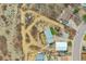 Home and acreage with long driveway, trampoline, grass, and metal outbuilding at 228 Birch Ave, Castle Rock, CO 80104