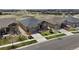 Expansive view of home in a neighborhood community surrounded by well-maintained landscaping at 23030 E Del Norte Cir, Aurora, CO 80016
