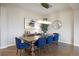 Bright dining room featuring modern lighting fixture, and sleek decor elements at 23030 E Del Norte Cir, Aurora, CO 80016