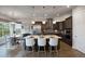 Modern kitchen featuring a center island, stainless steel appliances, and adjacent breakfast nook at 23030 E Del Norte Cir, Aurora, CO 80016