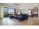 Comfortable living room open to kitchen and outdoor patio with scenic views at 23030 E Del Norte Cir, Aurora, CO 80016