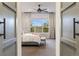 Spacious main bedroom with large windows and stylish decor, offering a serene retreat at 23030 E Del Norte Cir, Aurora, CO 80016