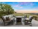 Outdoor patio featuring comfortable seating with a barrel firepit at 23030 E Del Norte Cir, Aurora, CO 80016