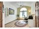 Functional home office with vaulted ceiling, natural light, and a comfortable workspace at 1313 Iris Cir, Broomfield, CO 80020