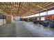 Interior view of barn with various ATVs, tools, and equipment storage at 5910 Mccart Ranch Cir, Elizabeth, CO 80107