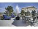 Outdoor deck featuring comfortable seating and a fire pit, perfect for entertaining with nice scenery at 5910 Mccart Ranch Cir, Elizabeth, CO 80107