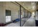 Indoor dog kennels featuring metal fencing, concrete flooring, and an indoor/outdoor run at 5910 Mccart Ranch Cir, Elizabeth, CO 80107