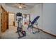Spacious carpeted exercise room equipped with modern fitness machines and ample space for workouts at 5910 Mccart Ranch Cir, Elizabeth, CO 80107