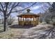 Charming gazebo nestled in a tranquil outdoor setting, perfect for relaxing and enjoying nature at 5910 Mccart Ranch Cir, Elizabeth, CO 80107
