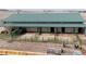 Horse barn with multiple stalls and individual outdoor spaces at 5910 Mccart Ranch Cir, Elizabeth, CO 80107