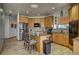 Well-equipped kitchen boasts stainless steel appliances, a central island, and granite countertop at 5910 Mccart Ranch Cir, Elizabeth, CO 80107