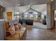 Spacious living room featuring high ceilings and large windows for natural light at 5910 Mccart Ranch Cir, Elizabeth, CO 80107