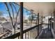 Inviting balcony with wooden floors and peaceful neighborhood views at 6762 E Briarwood Dr, Centennial, CO 80112