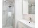 Sleek bathroom featuring a glass enclosed shower and white vanity at 6762 E Briarwood Dr, Centennial, CO 80112