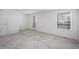 Bright and airy bedroom with large window and neutral carpeting at 6762 E Briarwood Dr, Centennial, CO 80112