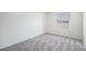 Bright bedroom with neutral carpet and a view from the window at 6762 E Briarwood Dr, Centennial, CO 80112