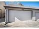 Garage door to the two car garage, number 6762 above the door at 6762 E Briarwood Dr, Centennial, CO 80112