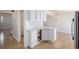 Bright kitchen features white cabinets, marble countertops, and stainless steel refrigerator at 6762 E Briarwood Dr, Centennial, CO 80112