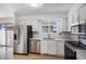Efficient kitchen layout with modern appliances and ample counter space at 6762 E Briarwood Dr, Centennial, CO 80112