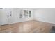 Bright living room featuring hardwood floors, natural light, and neutral color palette at 6762 E Briarwood Dr, Centennial, CO 80112