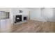 Spacious living room with fireplace and hardwood floors at 6762 E Briarwood Dr, Centennial, CO 80112