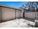 This concrete patio features a fence and space for outdoor enjoyment at 6762 E Briarwood Dr, Centennial, CO 80112