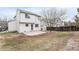 Fenced backyard with a storage shed and concrete patio at 1663 W 135Th Way, Denver, CO 80234