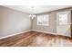 Dining area with hardwood floors, neutral paint, and natural light at 1663 W 135Th Way, Denver, CO 80234