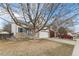 Charming two-story home featuring stone accents, a two-car garage, and a well-maintained front yard at 1663 W 135Th Way, Denver, CO 80234
