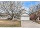 Charming two-story home featuring stone accents, a two-car garage, and a well-maintained front yard at 1663 W 135Th Way, Denver, CO 80234